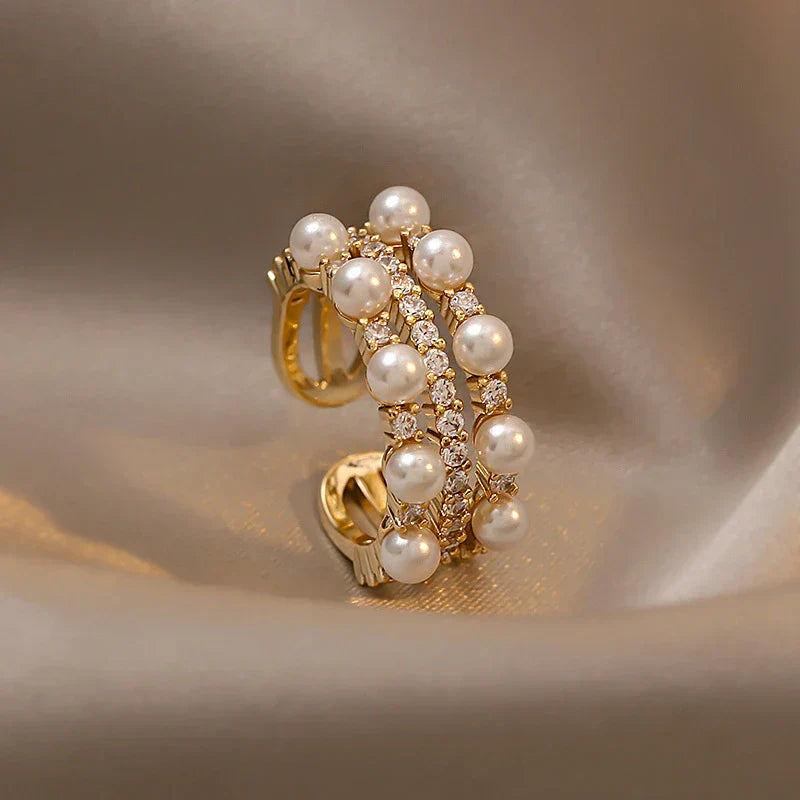 Adjustable double pearl ring in gold for an elegant style
